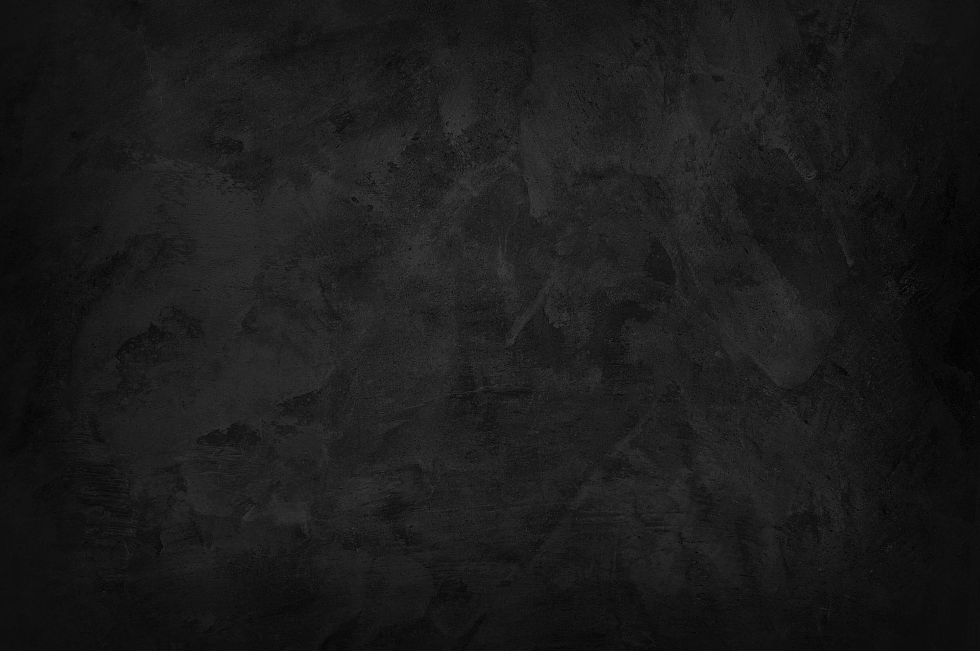 Dunkel strukturierter Hintergrund mit einer rauen, schmutzigen Oberfläche.